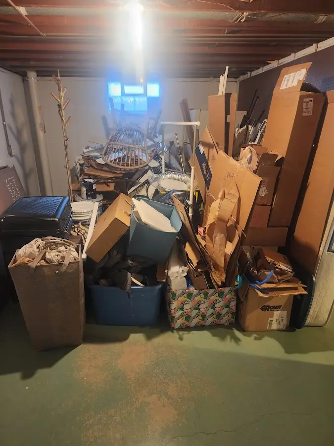 Roll-off dumpster container at job site for 2 Yard Dumpster Rental in Jackson